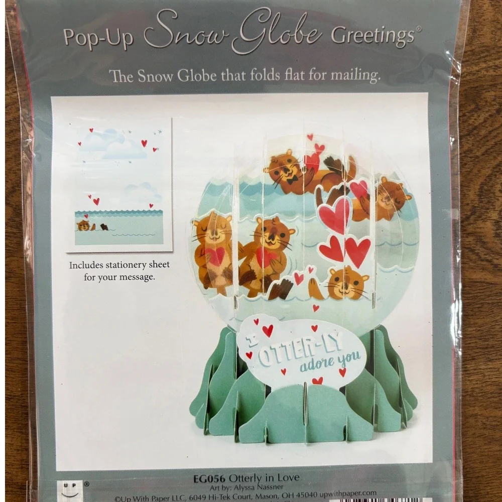 Up With Paper snow globe